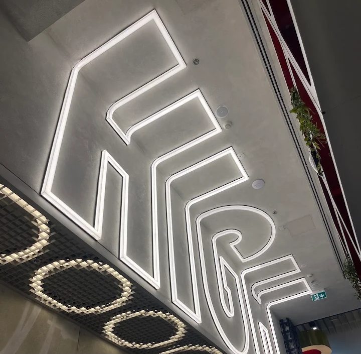 Photo from Naluyima Maria Gorretti: the glowing HIGH sign on the ceiling